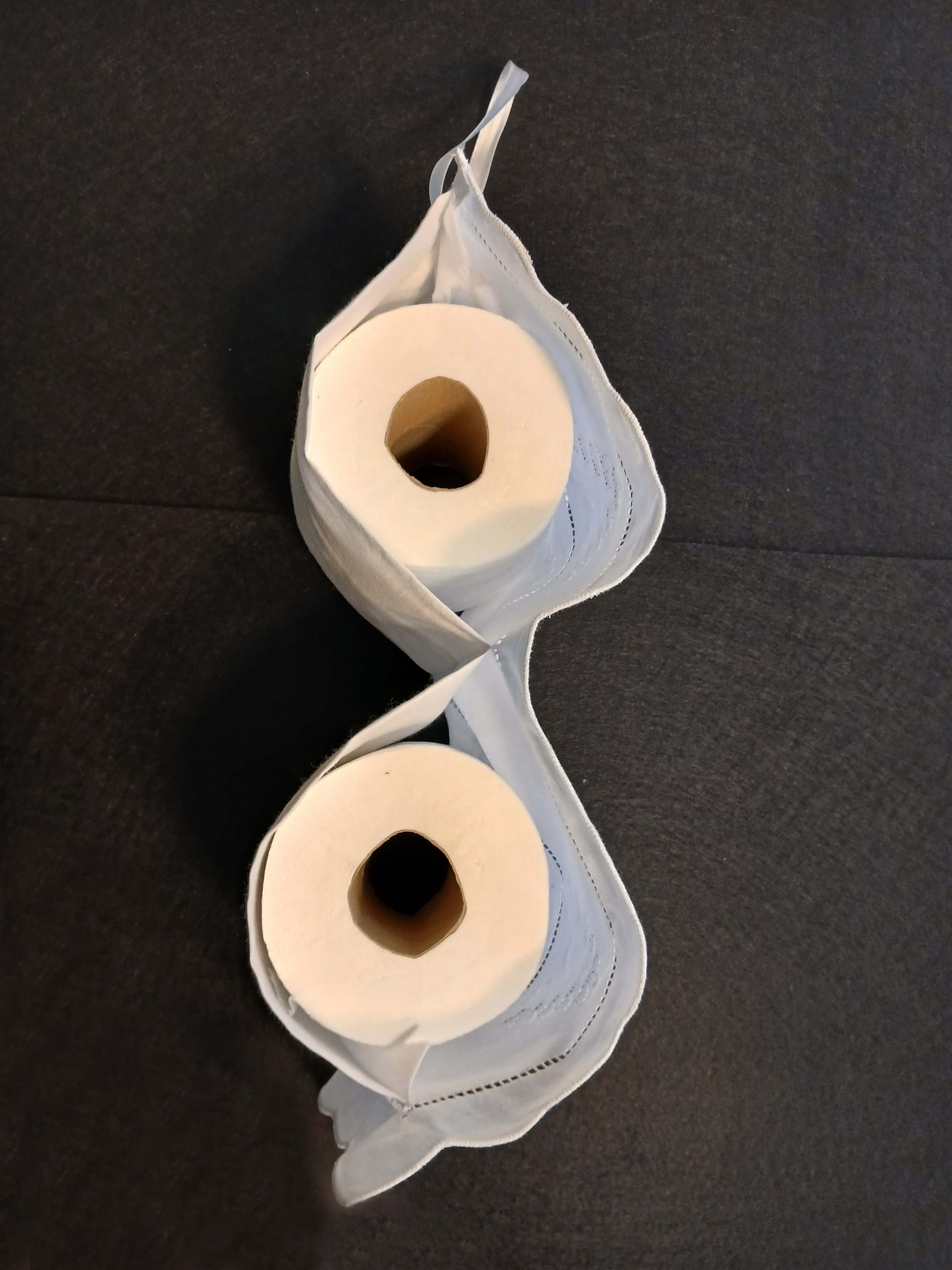 Suporte para papel higiénico bordado à mão