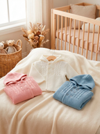 Baby cardigan in knit fabric with hood.